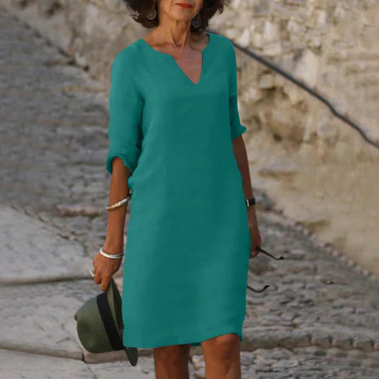 Sofia - vestido verde con cuello de pico